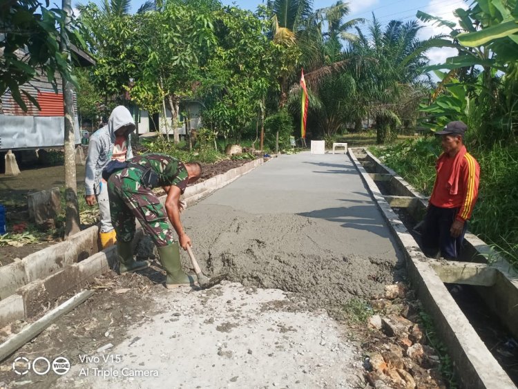 Satgas TMMD dan Warga Gotong royong Selesaikan Sasaran Fisik Semenisasi 