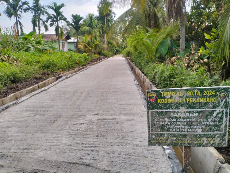Satgas TMMD Tuntas Semenisasi  Jalan di Lokasi TMMD